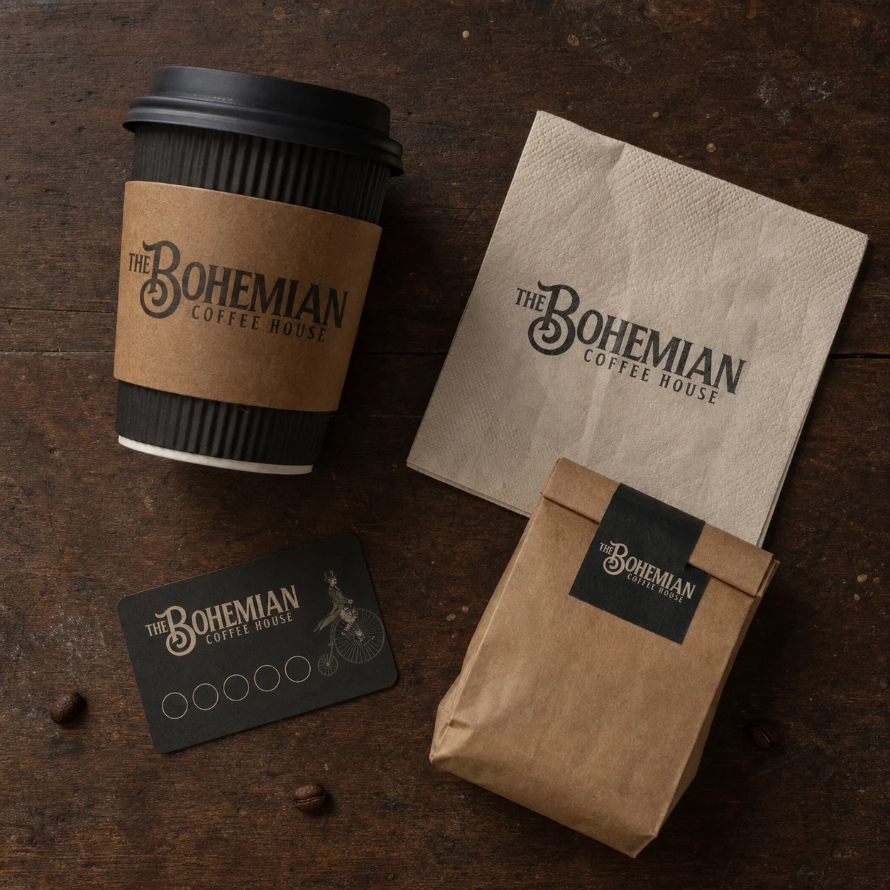 Bohemian Coffee House identity presented across a takeaway cup, napkin, loyalty card and coffee bag