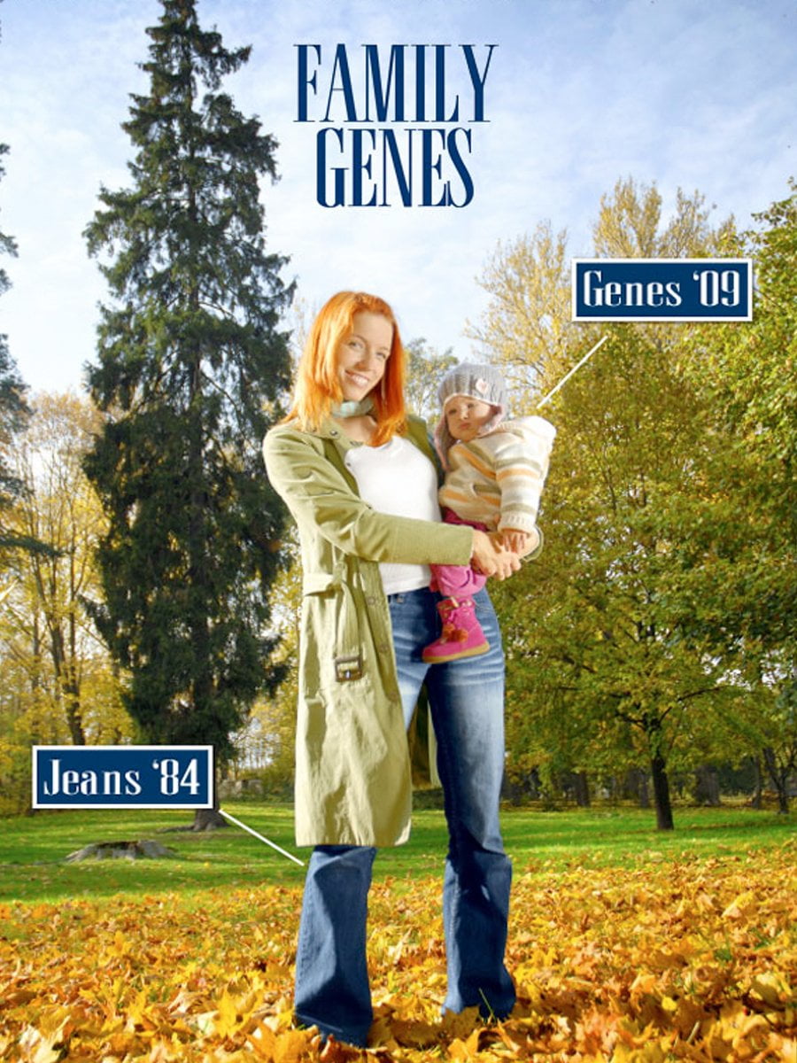 A woman holding a baby in the fall with the words family genes.